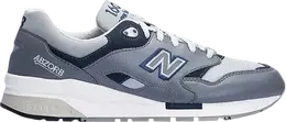 New Balance: Серые кроссовки 