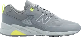 New Balance: Серые кроссовки 