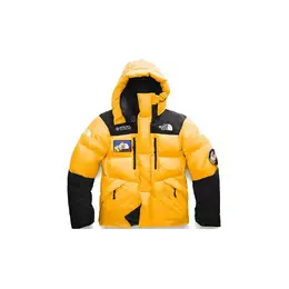 The North Face: Жёлтый пуховик 