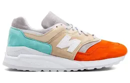 New Balance: Серые кроссовки 