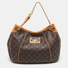 Louis Vuitton: Коричневая сумка 