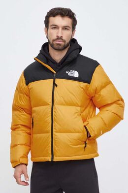 The North Face: Жёлтый пуховик 