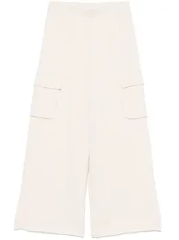 DKNY: Бежевые брюки 