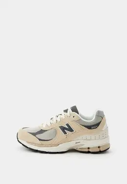 New Balance: Бежевые кроссовки 