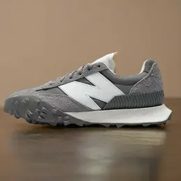 New Balance: Серые кроссовки  XC-72