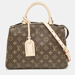 Louis Vuitton: Коричневая сумка 