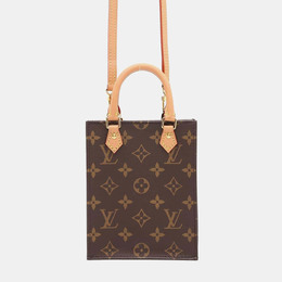 Louis Vuitton: Коричневая сумка 
