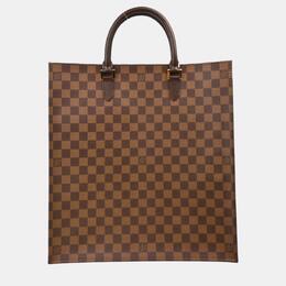 Louis Vuitton: Коричневая сумка-шоппер 
