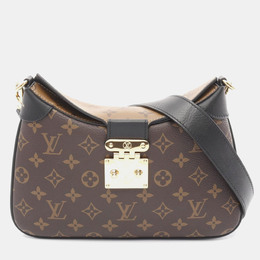 Louis Vuitton: Коричневая сумка 