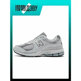 New Balance: Серые кроссовки  2002R