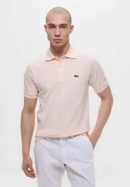 Lacoste: Розовое поло 