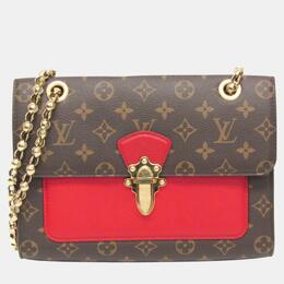 Louis Vuitton: Коричневая сумка 