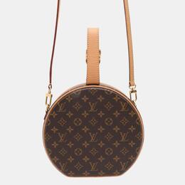 Louis Vuitton: Коричневая сумка 