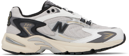 New Balance: Серые кроссовки 