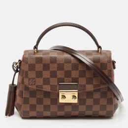 Louis Vuitton: Коричневая сумка 