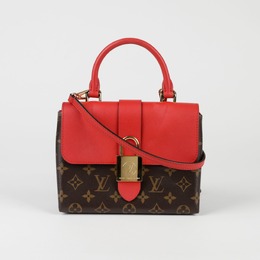 Louis Vuitton: Коричневая сумка 