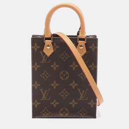 Louis Vuitton: Коричневая сумка 