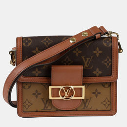 Louis Vuitton: Коричневая сумка 