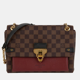 Louis Vuitton: Коричневая сумка 