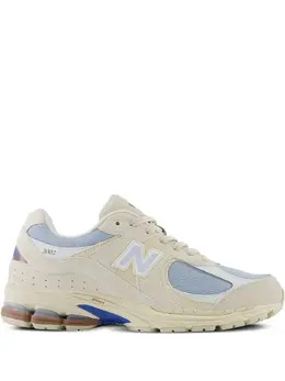 New Balance: Бежевые кроссовки  2002R