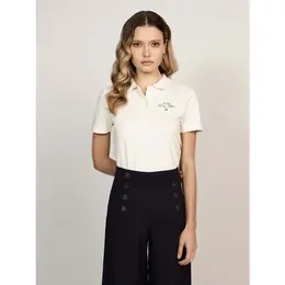 TOMMY HILFIGER: Бежевое поло 