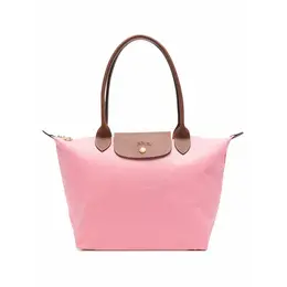 Longchamp: Розовая сумка 