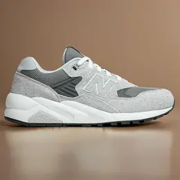 New Balance: Серые кроссовки 