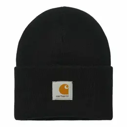 Carhartt WIP: Чёрная шапка 