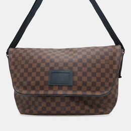 Louis Vuitton: Коричневая сумка 