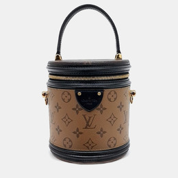 Louis Vuitton: Коричневая сумка 