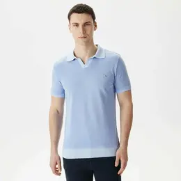 LACOSTE: Голубое поло 