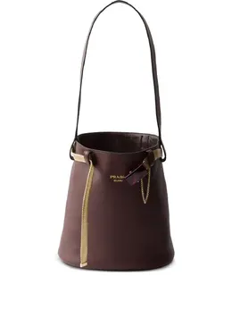 Prada: Коричневая сумка 