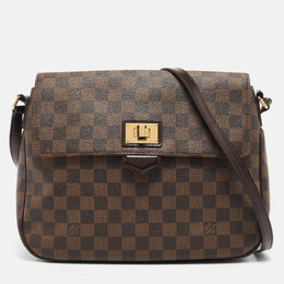 Louis Vuitton: Коричневая сумка 