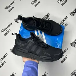 adidas: Чёрные кроссовки  NMD_R1