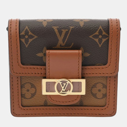 Louis Vuitton: Коричневая сумка 