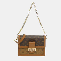 Louis Vuitton: Коричневая сумка 