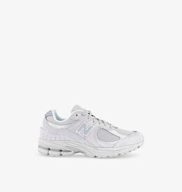 New Balance: Серые кроссовки 