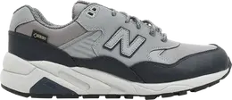 New Balance: Серые кроссовки 