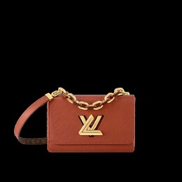 Louis Vuitton: Коричневая сумка 