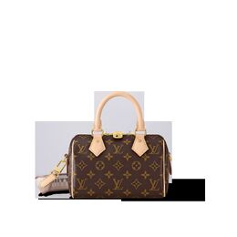 Louis Vuitton: Коричневая сумка 