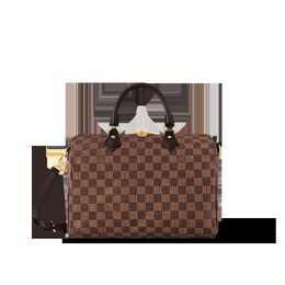 Louis Vuitton: Коричневая сумка 