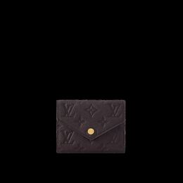 Louis Vuitton: Коричневый кошелёк 