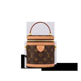 Louis Vuitton: Коричневая сумка 