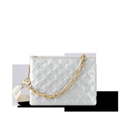 Louis Vuitton: Серебристая сумка 