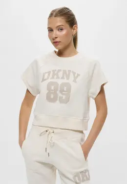 DKNY: Бежевая футболка 