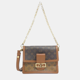 Louis Vuitton: Коричневая сумка 