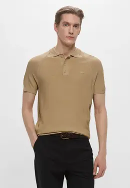 Lacoste: Бежевое поло 