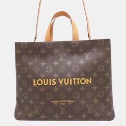 Louis Vuitton: Коричневая сумка-шоппер 