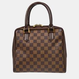 Louis Vuitton: Коричневая сумка 