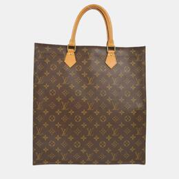 Louis Vuitton: Коричневая сумка-шоппер 